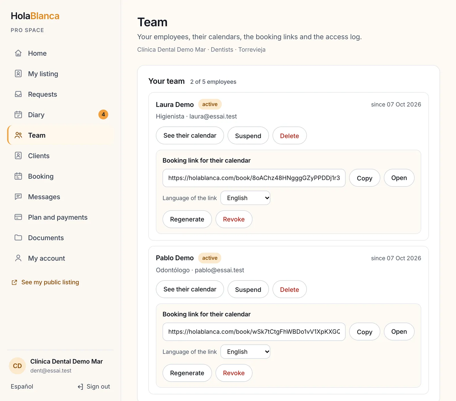 The Team screen: two employees, each with a booking link to copy, revoke or regenerate